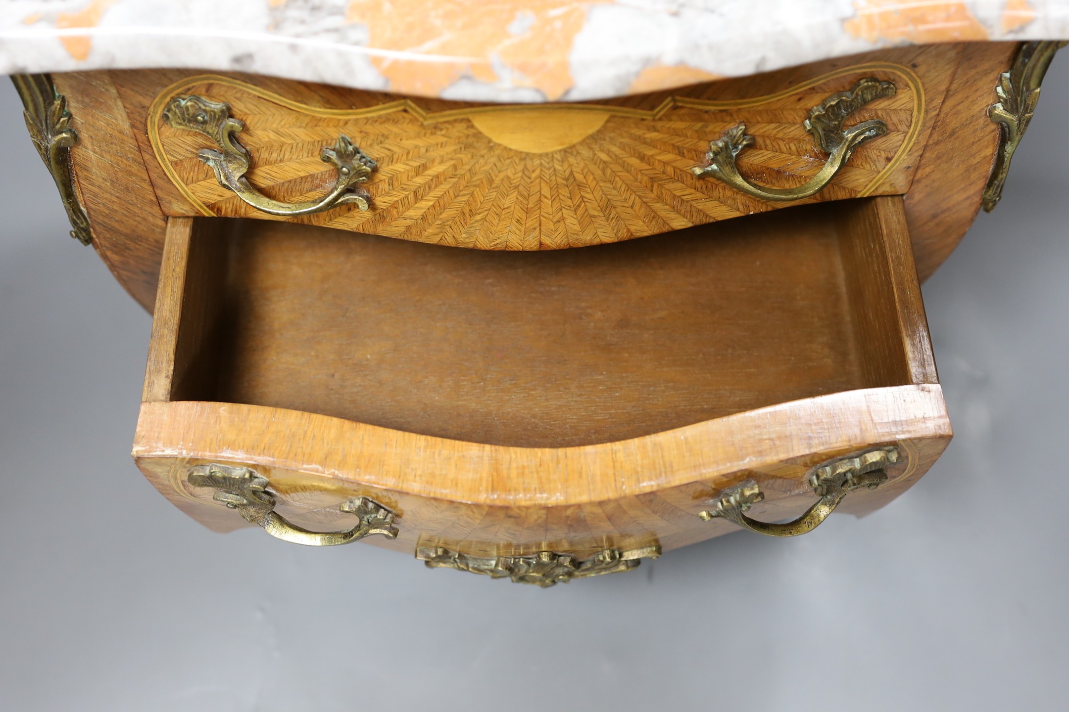 A miniature Louis XV style kingwood and marquetry marble topped serpentine commode, 35cm wide